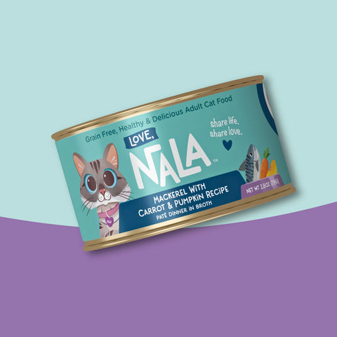 A can of NALA Love Mackerel with Carrot & Pumpkin Recipe adult cat food, shown at an angle on a split light blue and purple background.