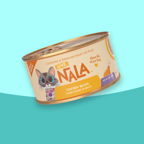 A single can of NALA Love Adult Cat Food, Chicken Recipe, shown at an angle on a split light blue and teal background. The label features a cartoon cat illustration and orange branding.