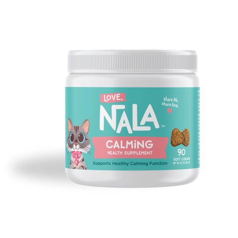 A white plastic jar of Nala Calming Health Supplement for cats, featuring a teal and pink label with an illustration of a cat and a piece of cat chew.